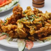Mixed Veggie Pakora · Lightly bathed in a besan batter and fried. Vegetarian, gluten free and dairy free.
