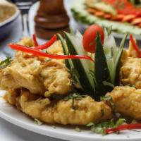 Mild Chicken Pakora · Lightly bathed in a besan batter and fried. Gluten free and dairy free.