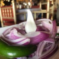 Onion Salad · Slices of onion, jalapeno and lemon.