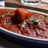 Vindaloo · A thick spicy and tangy gravy with potatoes.