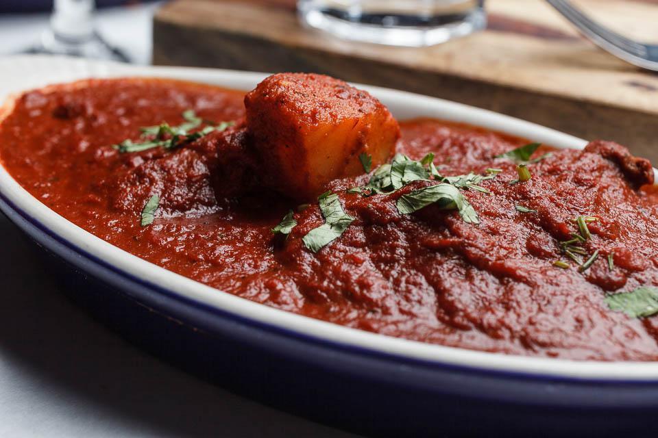 Vindaloo · A thick spicy and tangy gravy with potatoes.