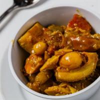 Achar · Mixed vegetables pickled with Indian herbs and spices.