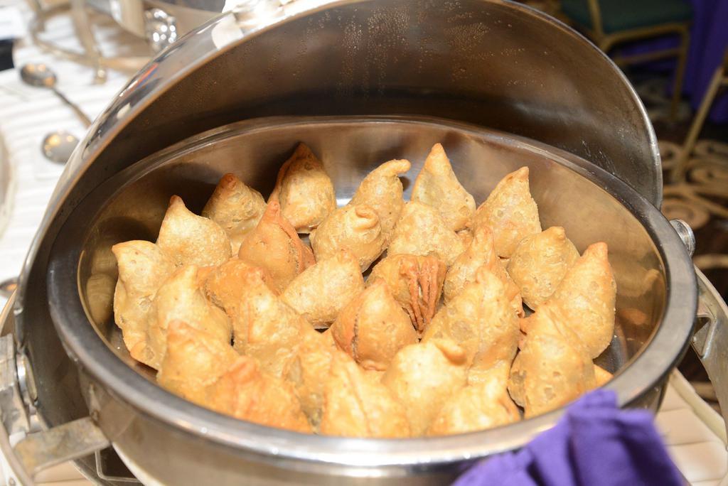 Samosa Party Pack · Spice up your party with our Samosa Party Pack! This Indian street food favorite is the perfect hearty snack for parties and gatherings. We'll even throw in the chutneys for dipping!