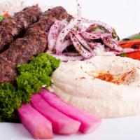 Kafta Kabob Plate · Lula kabob. Skewer of ground beef kneaded with chopped parsley, onions and spices, served wi...