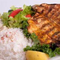Boneless Trout Fish Plate · Fresh grilled marinated trout, served with hummus, salad, rice and tahini sauce.
