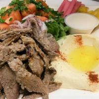 Tri Tip Shawarma Beef Plate · Marinated tri tip steak USDA choice cooked on vertical broiler then thinly sliced, served wi...