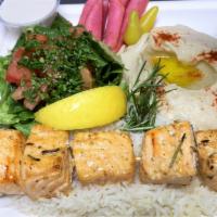 Salmon Kabob  · Wild salmon grilled  comes with hummus, rice, salad, pita bread and tahini