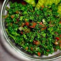 Tabouli Salad · A fresh mix of finely minced parsley, tomatoes, fresh mint, cracked wheat, diced onions, tos...