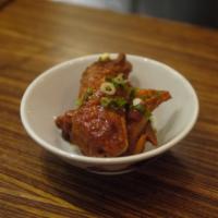 Klong Chicken Wings · Glazed with herbs and spices.