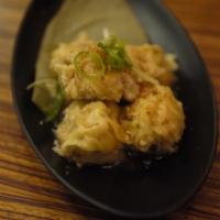 Chicken and Shrimp Dumplings · Served with house black bean mushroom sauce.