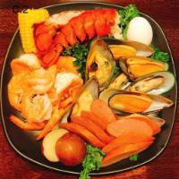 Seafood & Crab Boil - Combo 3 · 1/2 LB Snow Crab Legs
1/2 LB Shrimp (Headless)
1/2 LB Green Mussels
+ 2 X Corn on the Cob an...