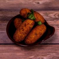 Cream Cheese Cutlets · Patties of potatoes and paneer cream cheese inside and deep fried, seasoned with mild spices...