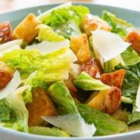 Caesar Salad · Crisp romaine, croutons and shaved Parmesan.