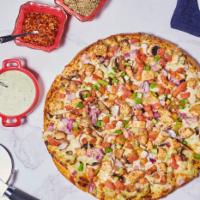 Garlic Chicken Pizza · Garlic mushrooms, red onions, garlic chicken breast, tomatoes and Parmesan  topped with gree...