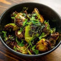 Brussel Sprouts · Crispy Brussel Sprouts with Soy Sauce Vinaigrette and fresh cilantro.