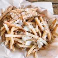 Truffled Garlic Parmesan Fries · Topped with shaved Parmesan flakes.