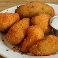 Breaded Cauliflower Bites · Served with blue cheese.