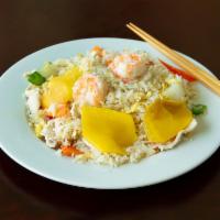 123a. Mango Fried Rice · Rice with chicken, shrimp, snow peas, mango, carrot and onion.