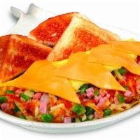 The Skillet Omelet · An omelet stuffed with hashbrowns, ham, green peppers, onions, and topped with American chee...