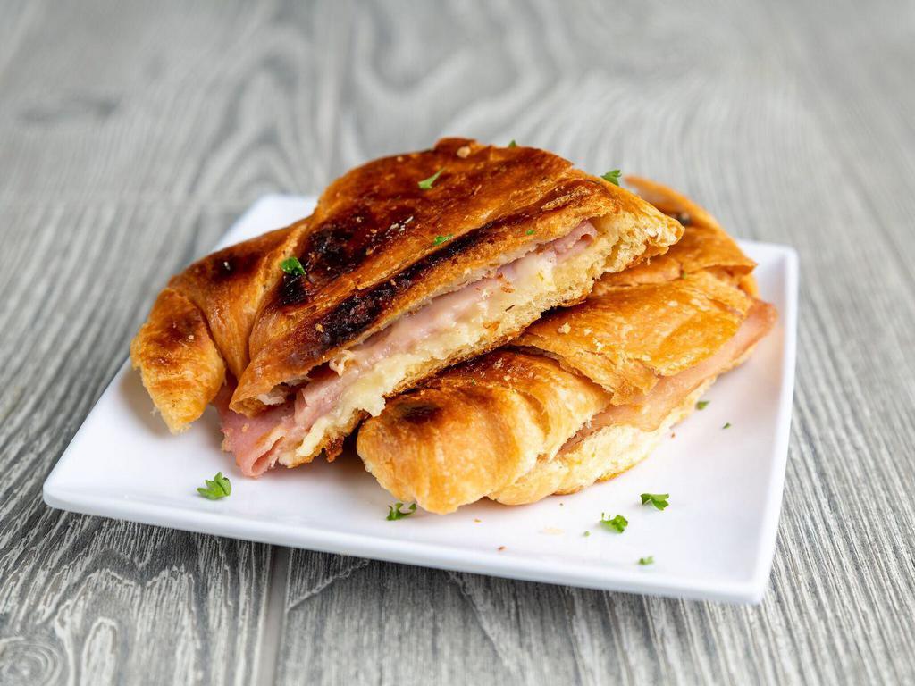 Croissant Sandwich · Croissant with ham and cheese.