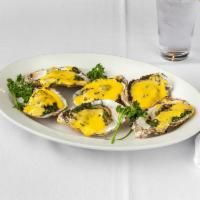 *Oysters On 1/2 Shell · Mollusk that was prepared and served inside it’s shell.