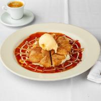 *Warm Apple Tart · Homemade pastry with baked apples with caramel sauce and a scoop of vanilla ice cream.