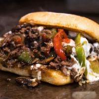 Steak Bomb Sandwich · Sliced sirloin beef, topped with sauteed onions, peppers, mushrooms and melted provolone. Se...