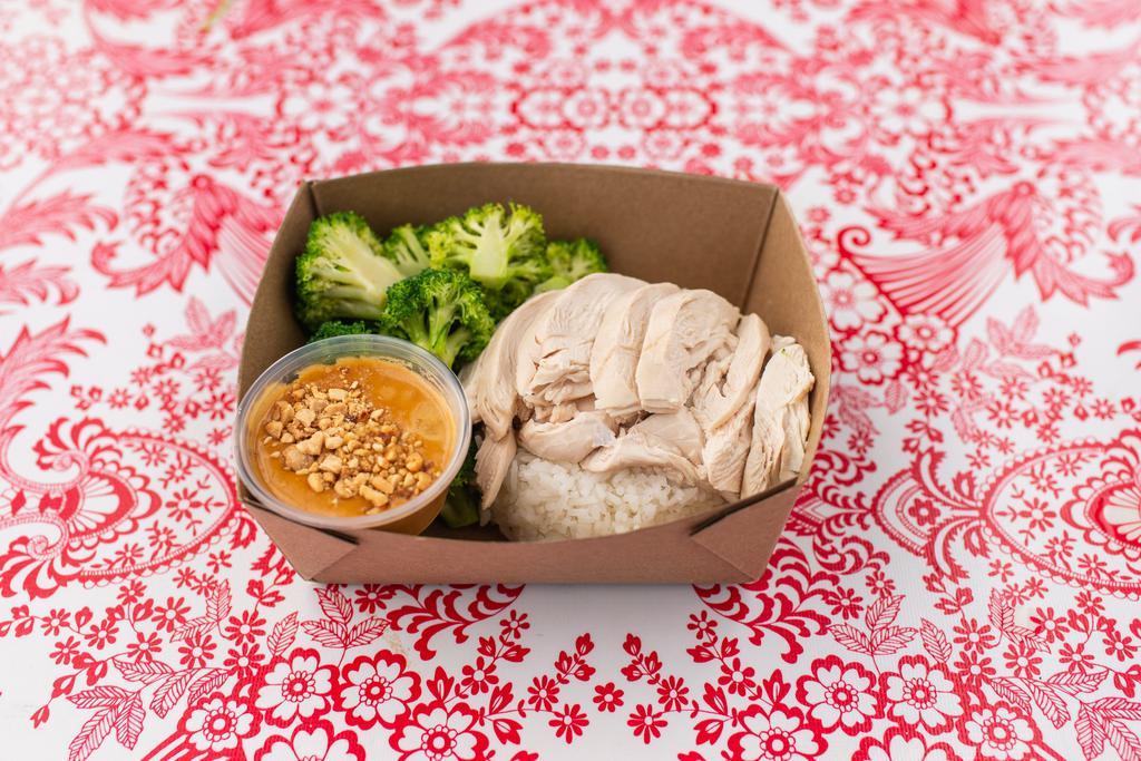 Chicken Peanut · Chicken (Mary’s Organic) and steamed broccoli served on Khao Man Gai Rice (jasmine rice cooked in chicken stock) with Nong’s peanut sauce (GF).