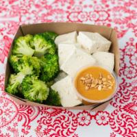 Tofu Peanut (V/GF) · Steamed OTA tofu and steamed broccoli served on brown Jasmine rice with Nong’s peanut sauce ...