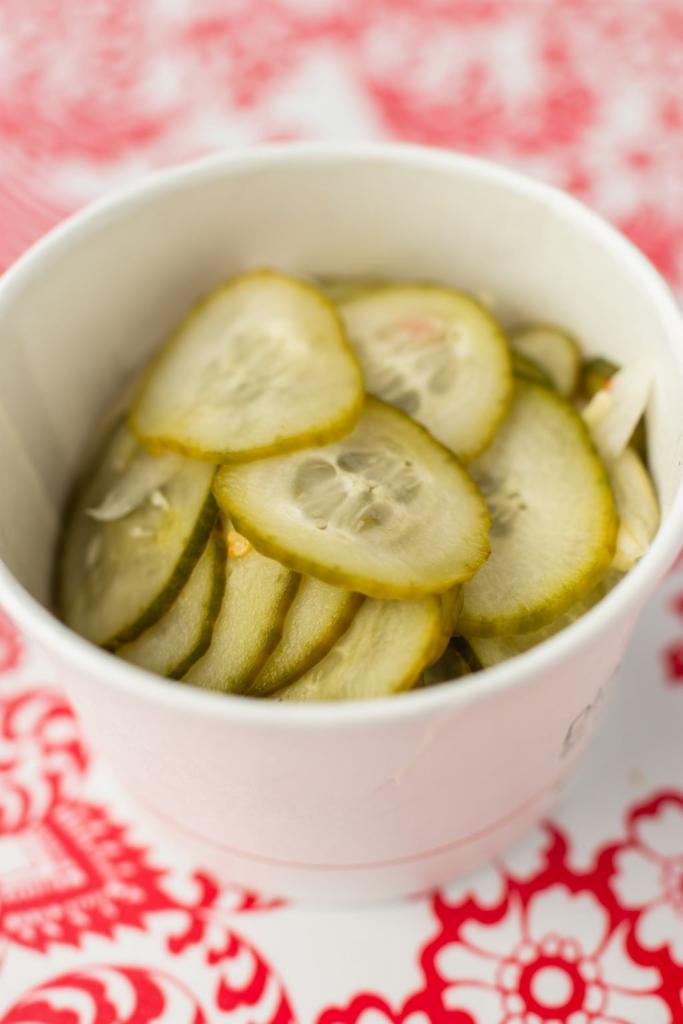 3.25 oz. Pickles · House-made thai style pickles. Gluten free. Shallots, ginger, cucumber, chili peppers, white vinegar, sugar, salt a little spicy. Keep refrigerated. Small batch, labor intensive.