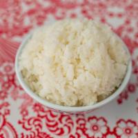 Side Jasmine Rice · It's Jasmine rice cooked in water.