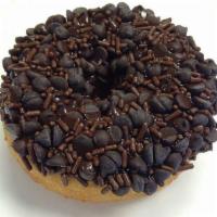 Chocolate Coma Donut · Chocolate icing, topped with mini chocolate chips and chocolate sprinkles.