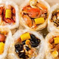 Create Your Own Seafood Combo · Choose any 1/2 LB of seafood Min 2 items come with Corn, potato& sausage9
