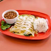 Enchiladas Espinaca · Spinach sauteed with mushrooms, onions, tomatoes, cilantro and jalapenos, rolled into 2 corn...