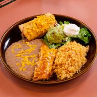Grande #1 Combo · Choice of 2 enchiladas, tacos, tostadas, tamales or any combination of two. Served with blac...