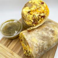 Breakfast Burrito Breakfast · Organic eggs, cheese, house potatoes with your choice of protein.