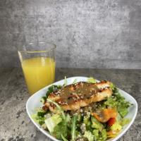 salmon quinoa salad  · arugula, lettuce, cucumbers, bell pepper, quinoa, capers with balsamic dressing 