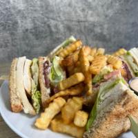 Chicken Club · Chicken breast, thick cut bacon, avocado, lettuce, tomato, fontina cheese and mayo on wheat....