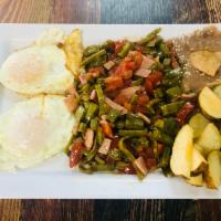 Nopales a la Mexicana · Mexican style cactus, onion, tomato and chile, ham and 2 eggs and beans and potatoe.