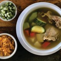 Chicken Soup with Rice · Chicken with potatoe, squash, carrot, chayote, and rice.