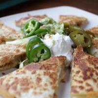 Quesadilla · Served with guacamole, sour cream and jalapenos.