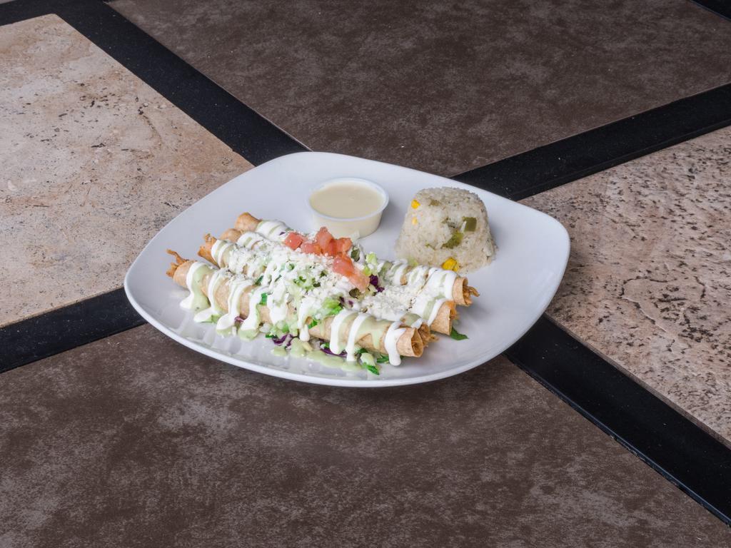 Chicken Flautas (4 pcs) · Corn tortillas stuffed with shredded chicken, crisped to perfection dressed in lettuce, tomatoes, guacamole, sour cream. Served with queso Blanco. Served with Aguirre's rice.