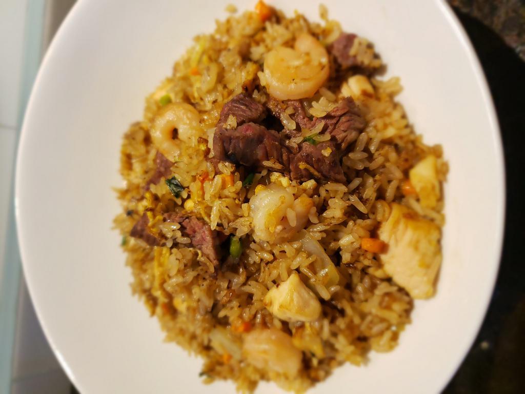 Fried Rice · Choice of chicken, beef, shrimp stir-fried rice and vegetable.