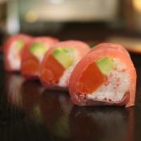 Love Love Roll · Crab meat, fresh salmon, wrapped in fresh tuna and soy paper with spicy miso sauce.