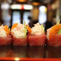 Red Rose Roll · Salmon, crab meat, cucumber, avocado wrapped in tuna with special sauce (no rice).