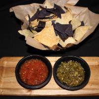 Chips & Salsa · First basket complimentary. House corn tortilla chips served with roasted tomato red salsa a...