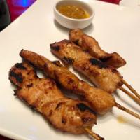 Satay · Choice of chicken or beef. Served with Thai peanut sauce.