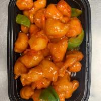 Sweet and Sour Chicken · Served with white rice. Bell peppers, yellow onions, carrots and pineapples.