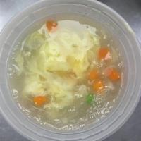 Egg Drop Soup · Peas and carrots and egg.