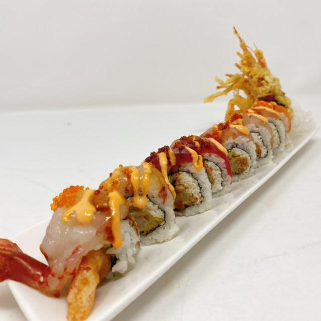 A's Special Roll · In: tempura shrimp, real crab, cucumber. Top: tuna, salmon, hamachi and ama-ebi with chef special sauce.